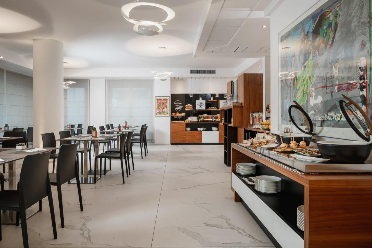 Dan Hotel Ричоне Екстериор снимка